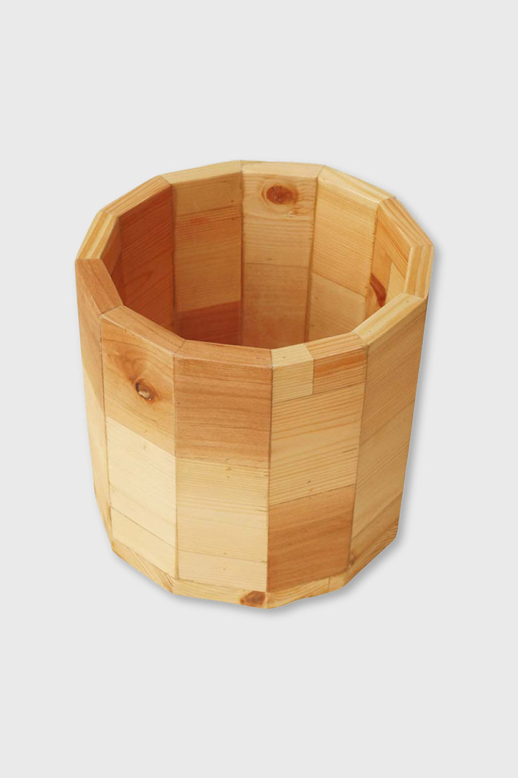 Stylish round wooden planter handcrafted by Exoticura